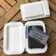The packaging reminds me of cheap to-go containers, but it’s all made from recycled scrap paper.